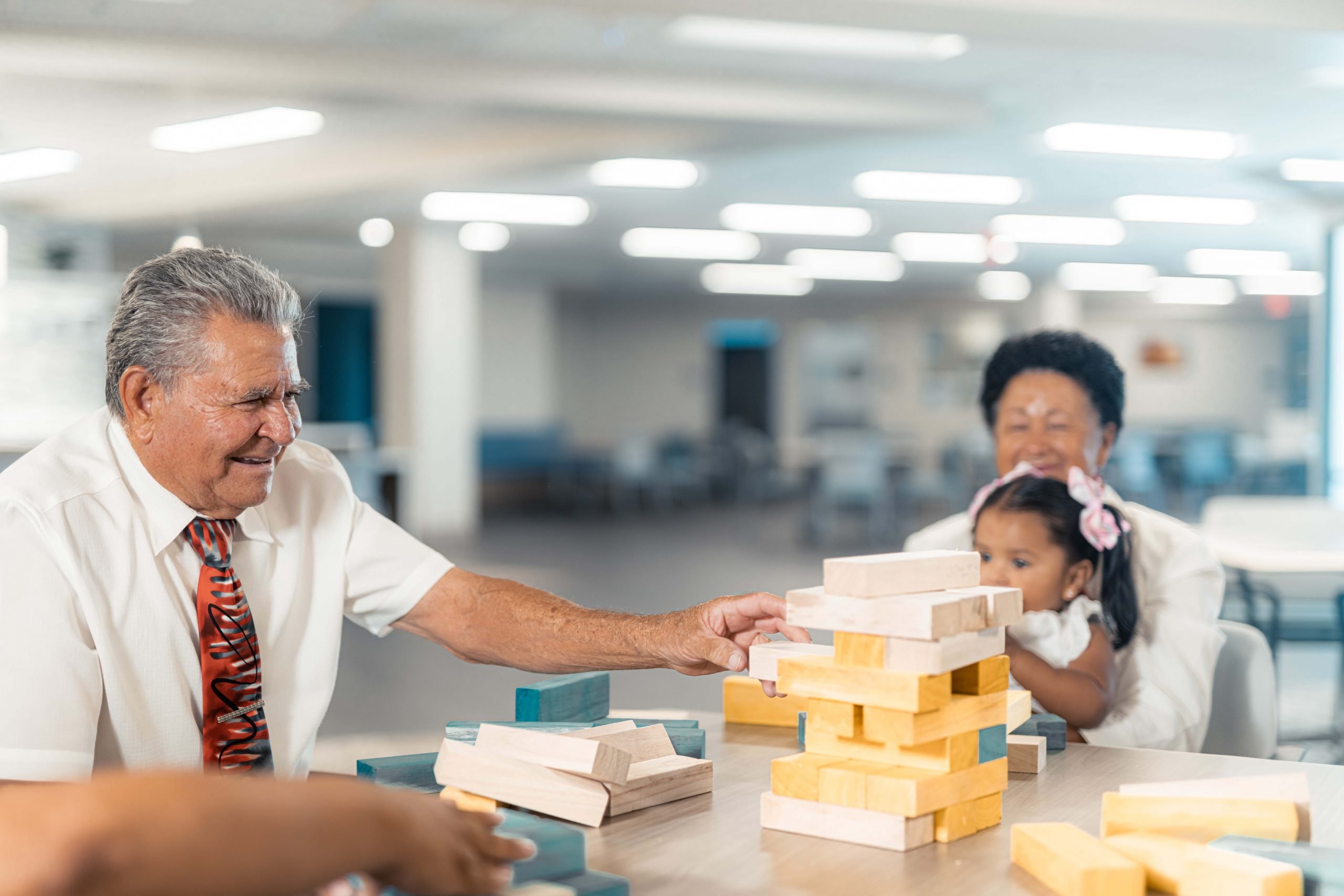 PACE Participant playing Jenga with another PACE participant PACE Participant playing Jenga with another PACE participant